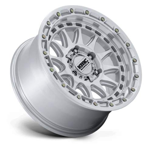 KMC KM556 CRUX Gloss Silver W/ Machined Face wheel showcasing rugged design and durability for off-road vehicles.