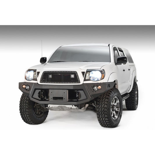 Fab Fours Premium Heavy Duty Winch Front Bumper 2 Stage Black Powder Coated w/o Grill Guard Incl. 1 in. D-Ring Mounts/Light Cut-Outs w/Hella 90mm Fog Lamps And 60mm Turn Signals l TT05-B1551-1