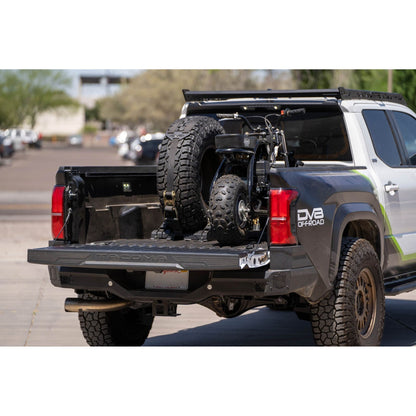 DV8 Off-Road Truck Bed Universal Tire Carrier & Accessory Mount C3| UNBM-01